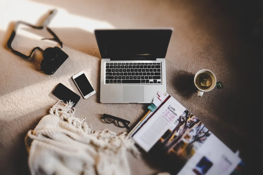 A freelancer working on a laptop with AI tools